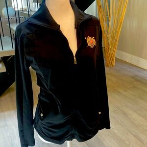 Vintage Pine Lakes Country Club Addis’s athletic jacket,